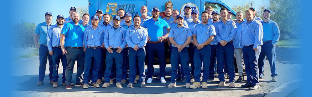 Rooter Ranger Team Standing in Front of a Service Truck